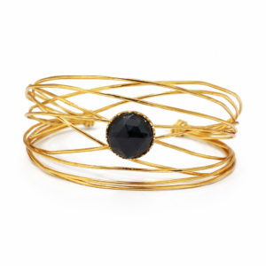 Xειροποίητο βραχιόλι από Ασήμι 925, με επιχρύσωση Κ18, αιματίτη, λεπτές βέργες και ανοιχτή βάση. Εντυπωσιακό statement κόσμημα για κάθε εμφάνιση.