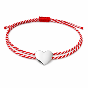 Χειροποίητο διπλό βραχιόλι μαρτάκι με κόκκινο-λευκό κορδόνι και μεταλλική καρδιά σε ασημί τόνο. Ρυθμιζόμενο, ιδανικό για δώρο Μαρτίου.